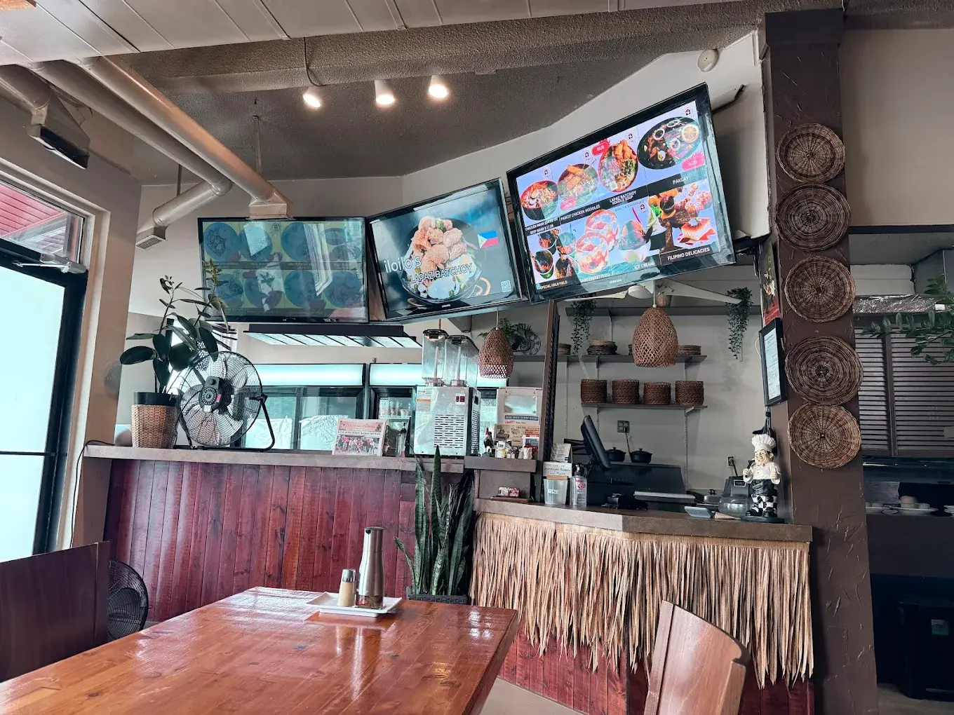 Experience authentic Filipino cuisine at Chicken House & Catering on Whyte Avenue